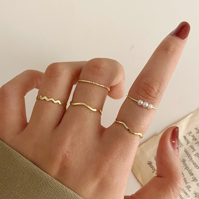 Five-piece gold ring