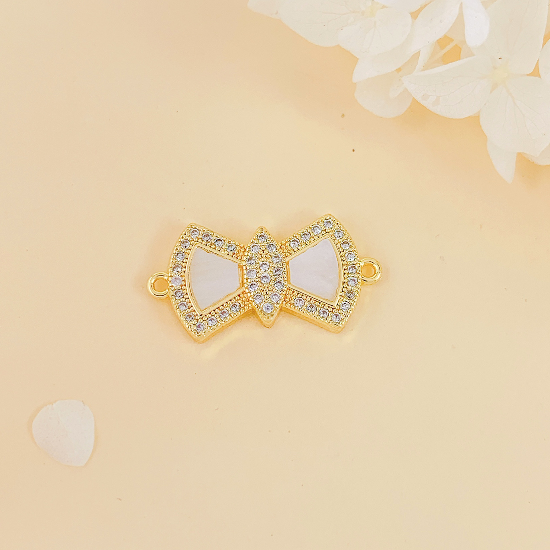 Sl610 bow pendant gold