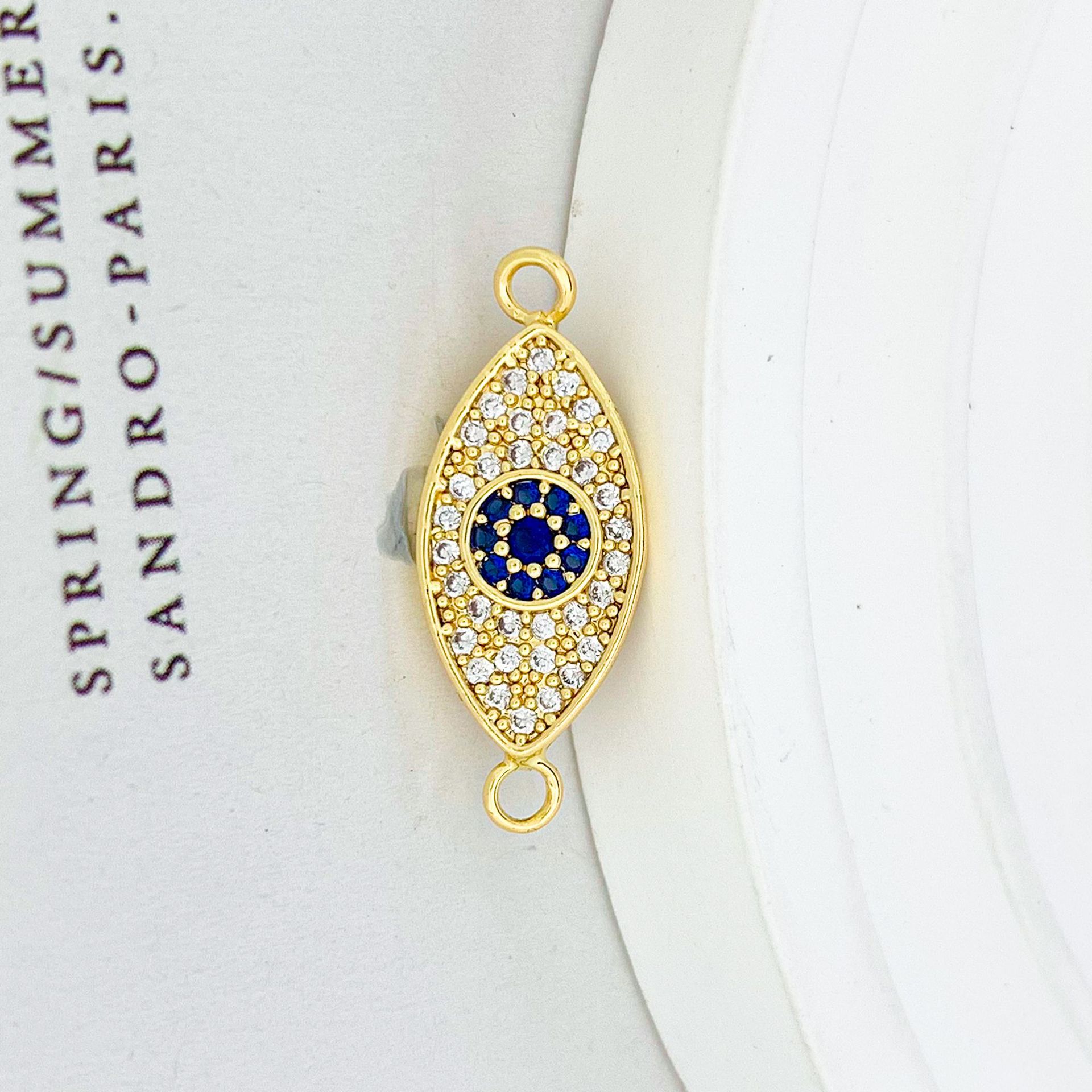 Sl666 blue eyes pendant gold