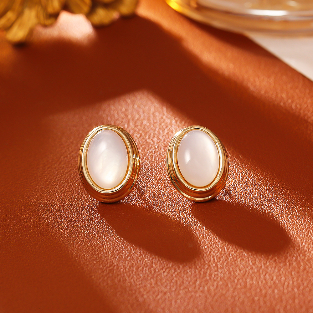 Soft-gloss white stud earrings