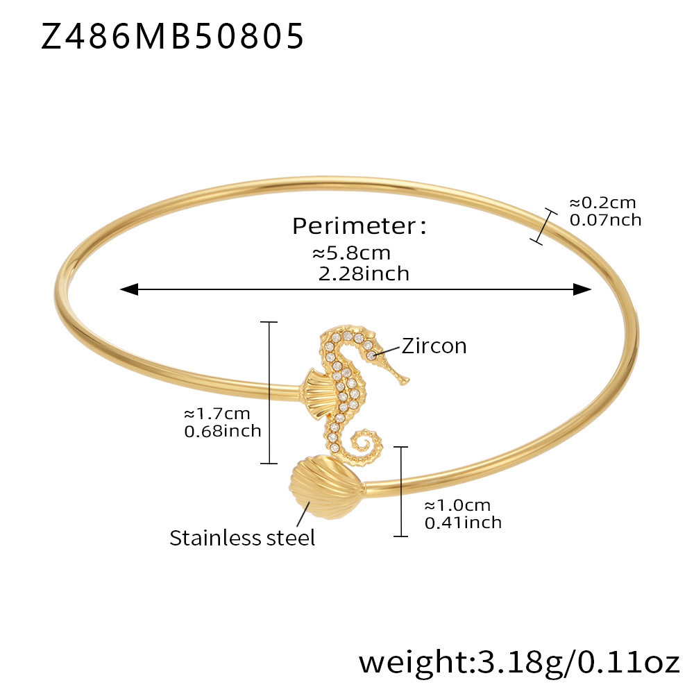 Golden seahorse shell open bracelet