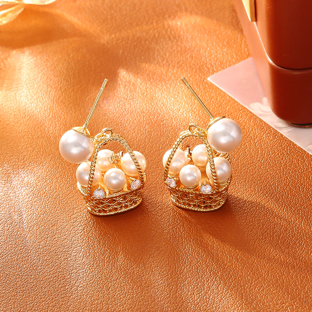 Pearl flower basket stud earrings