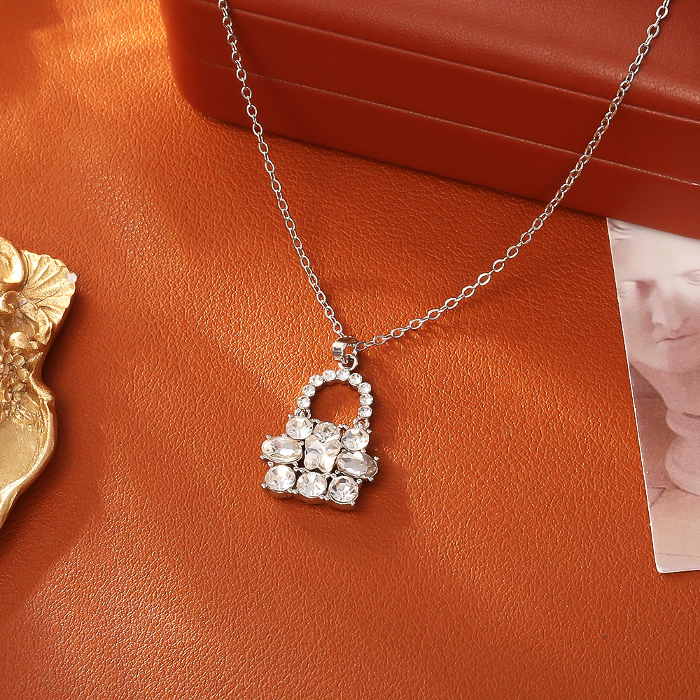 White butterfly-shaped zircon bag necklace