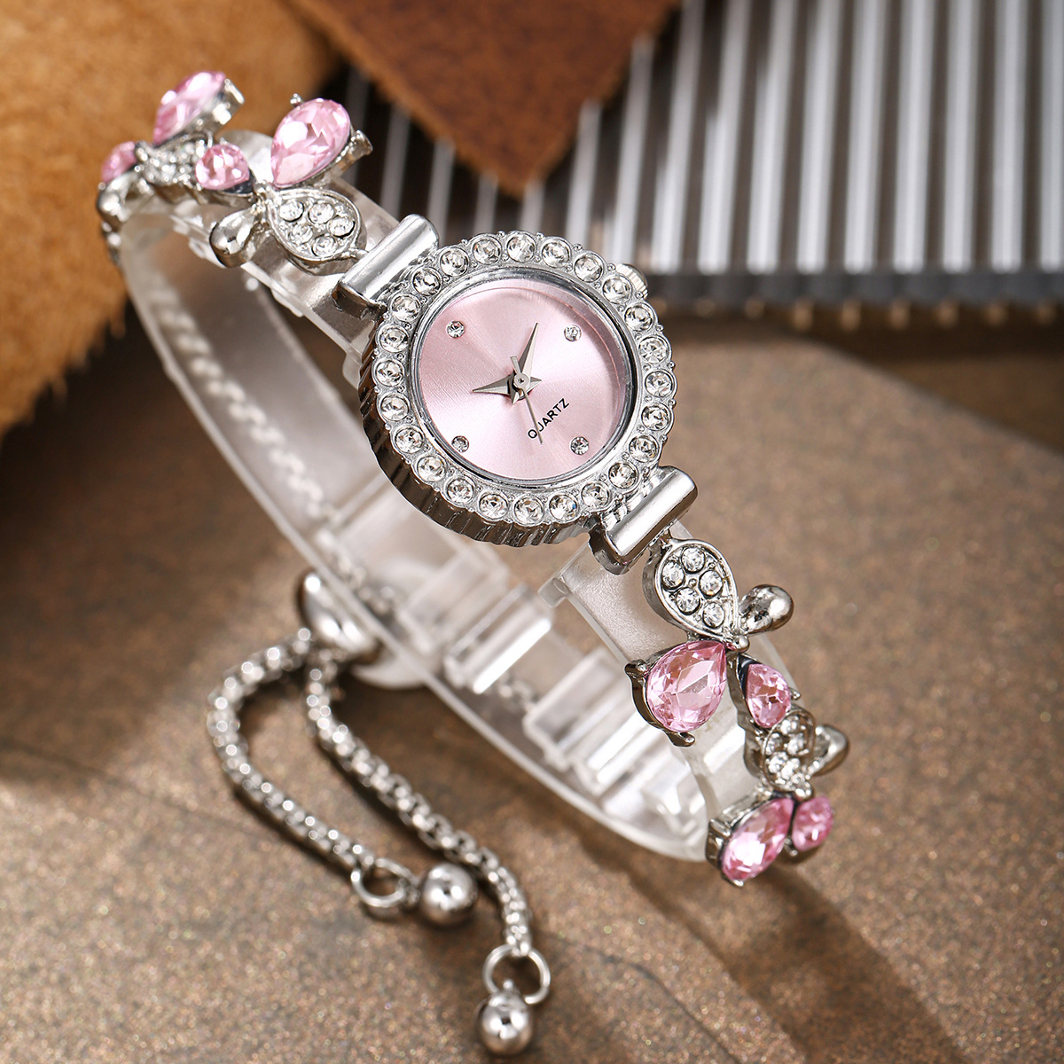 Silver ribbon pink diamond