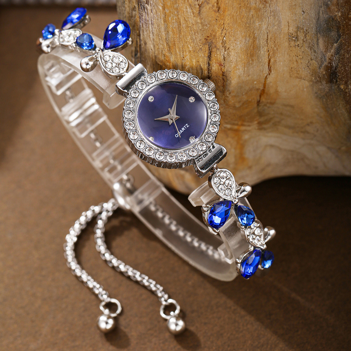 Silver band with blue diamond