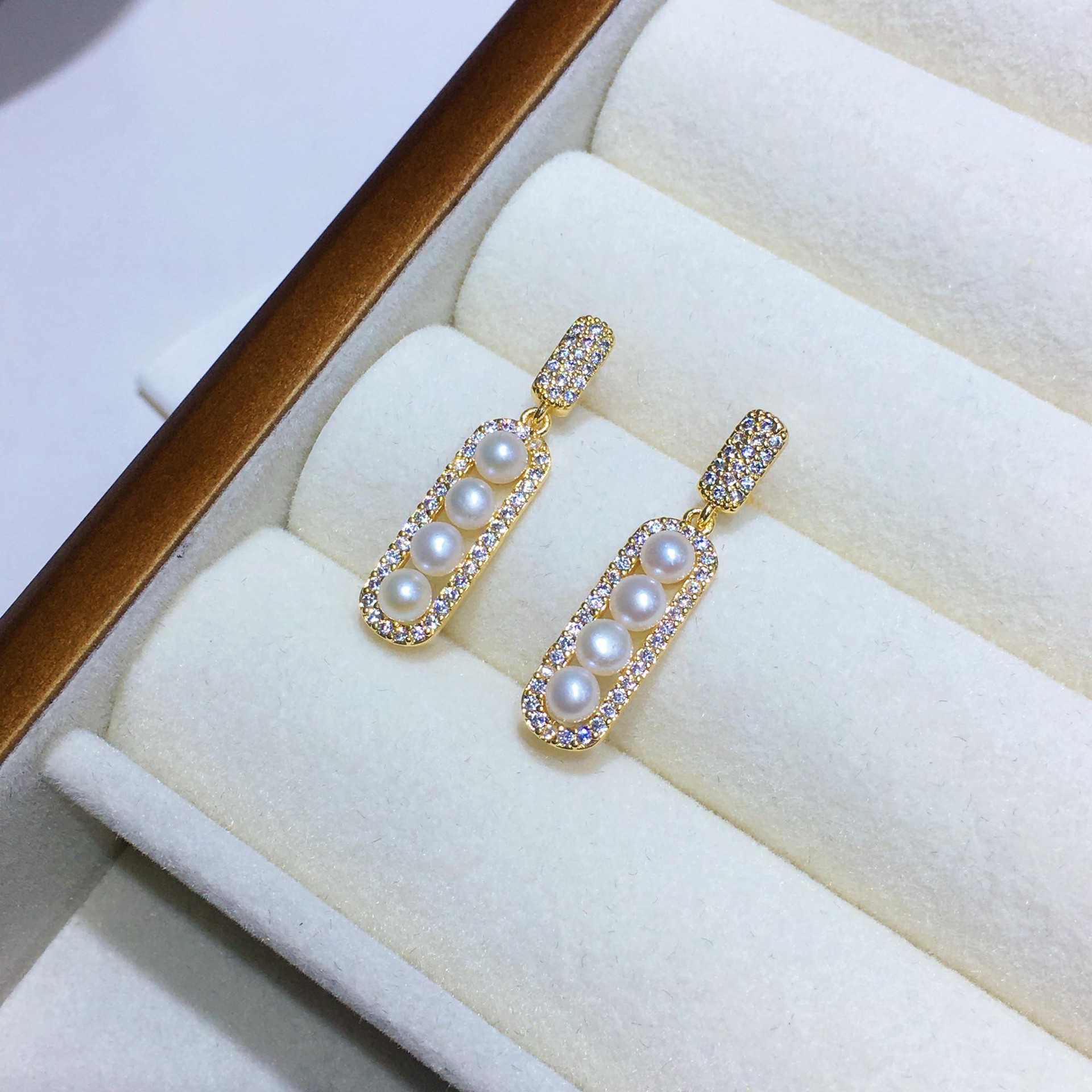 One-line stitch earrings (14k gold injection) natural freshwater fat steamed bun pearls