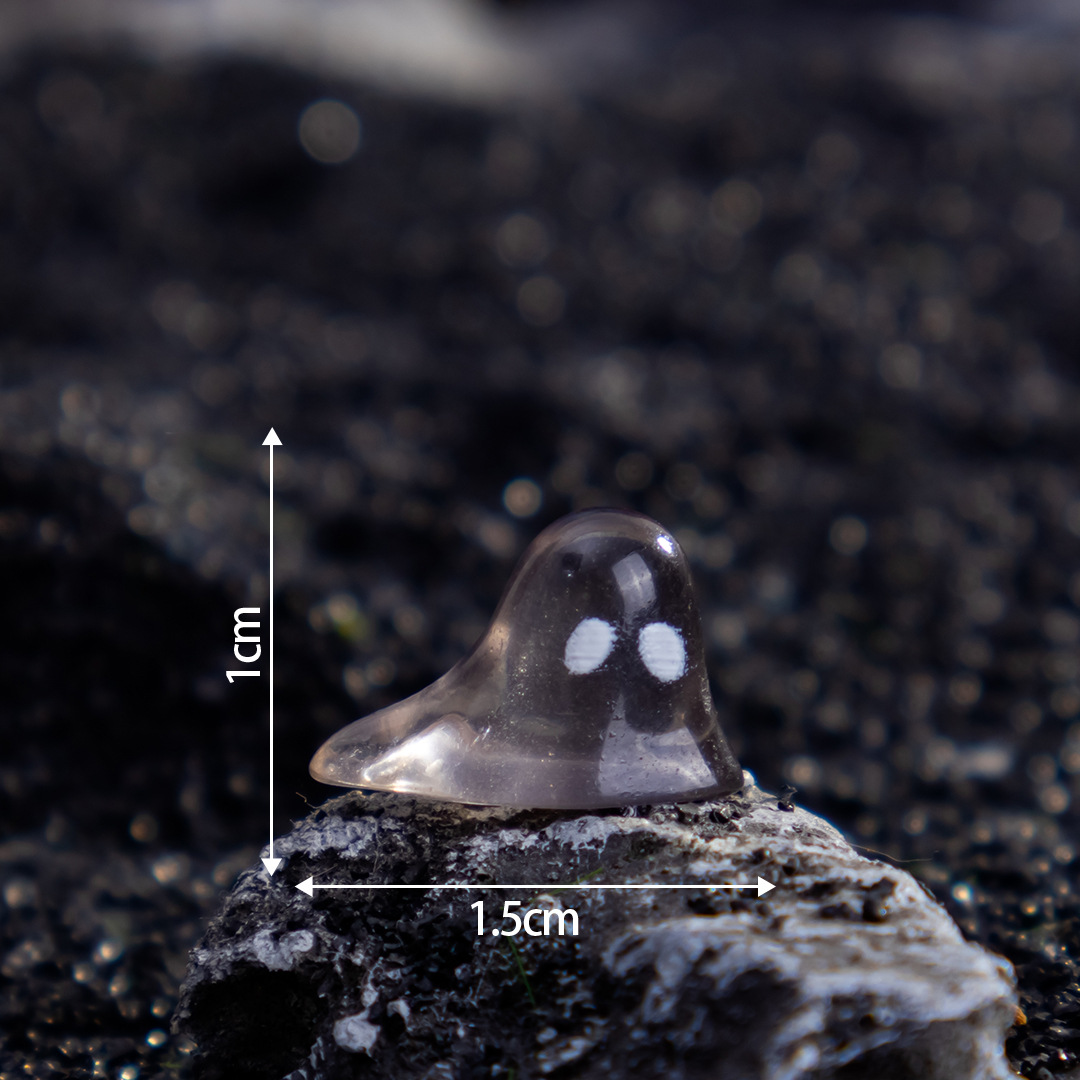 Glossy-black mouthless ghost