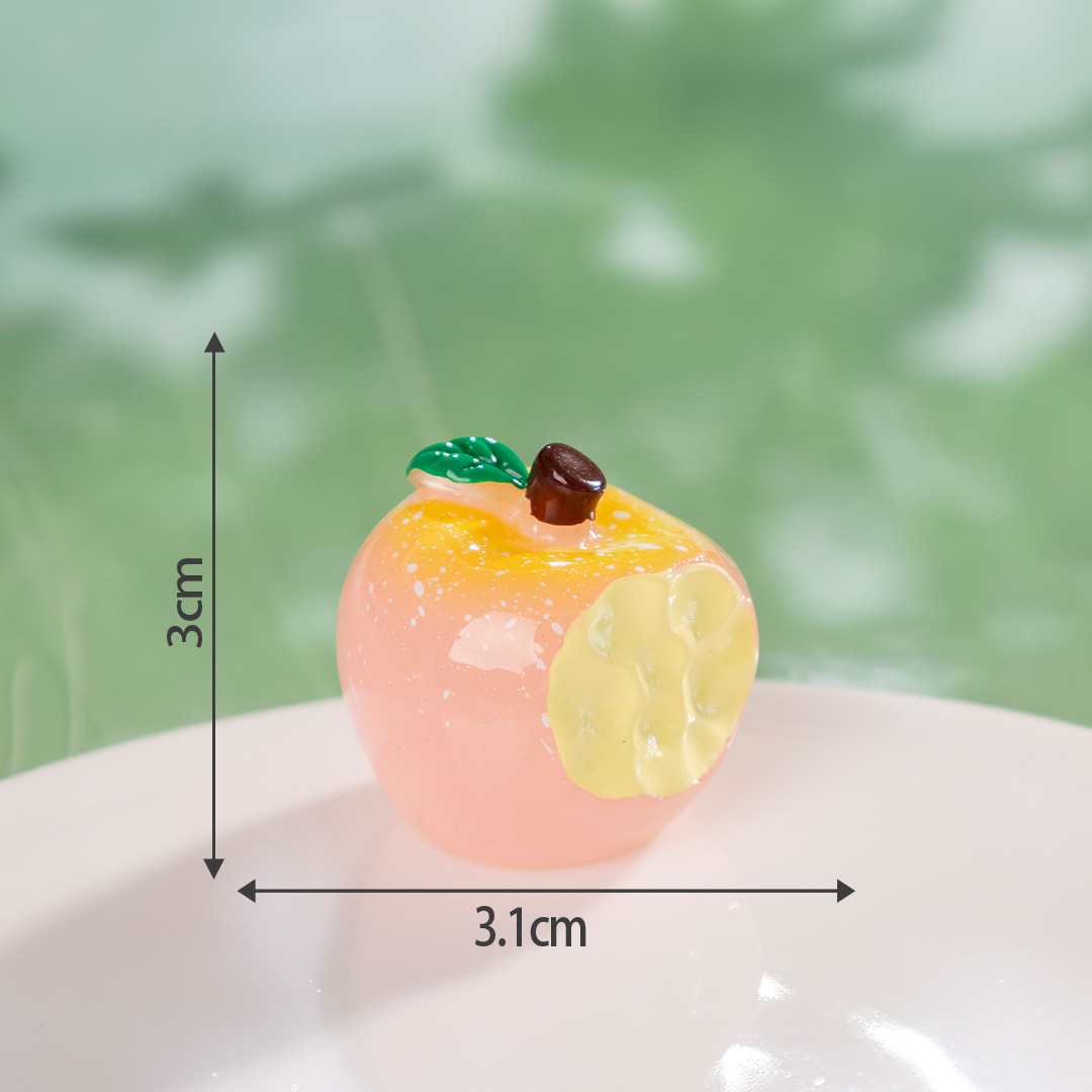 Take a bite of a pink apple