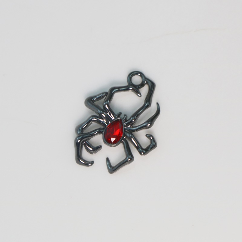 The gun is black with red diamonds