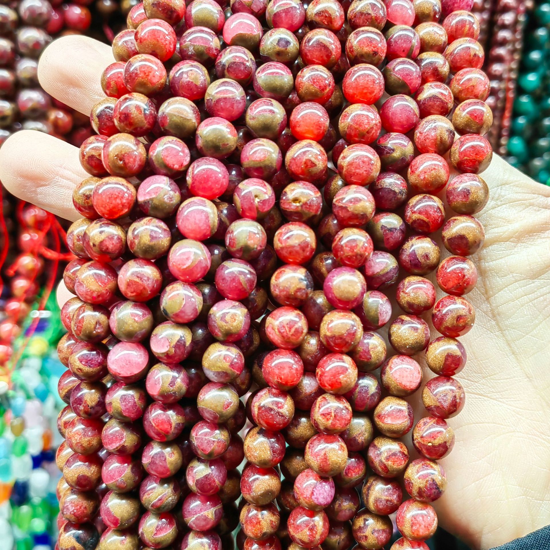 Golden colored stone--rose red
