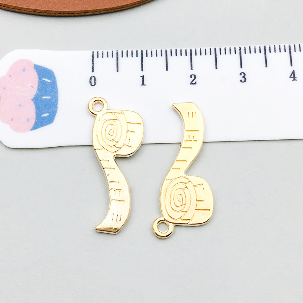 1 kc gold measuring tape 11*27mm-1.3g-20255