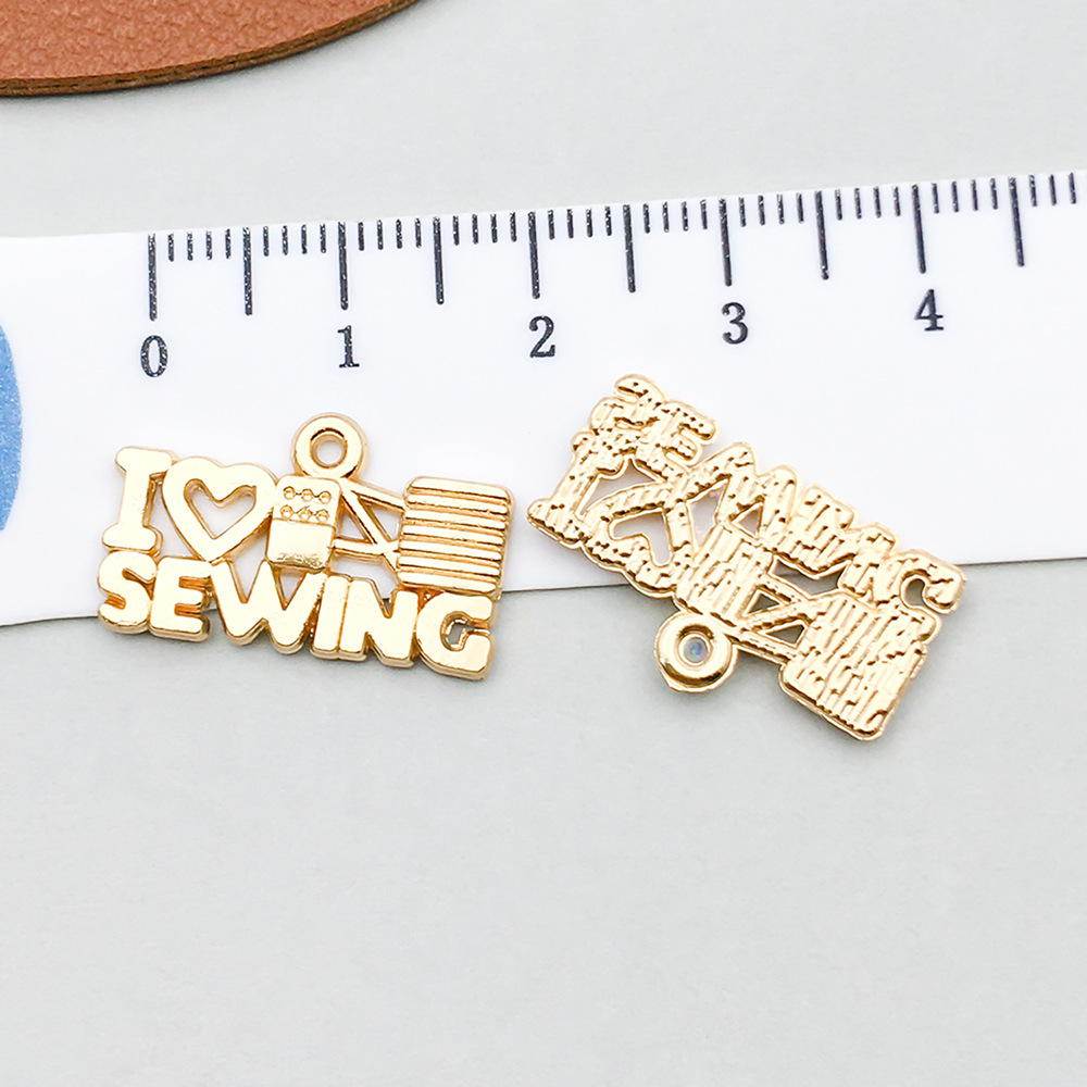 1 kc gold english letter 21*12mm-1.4g-20257