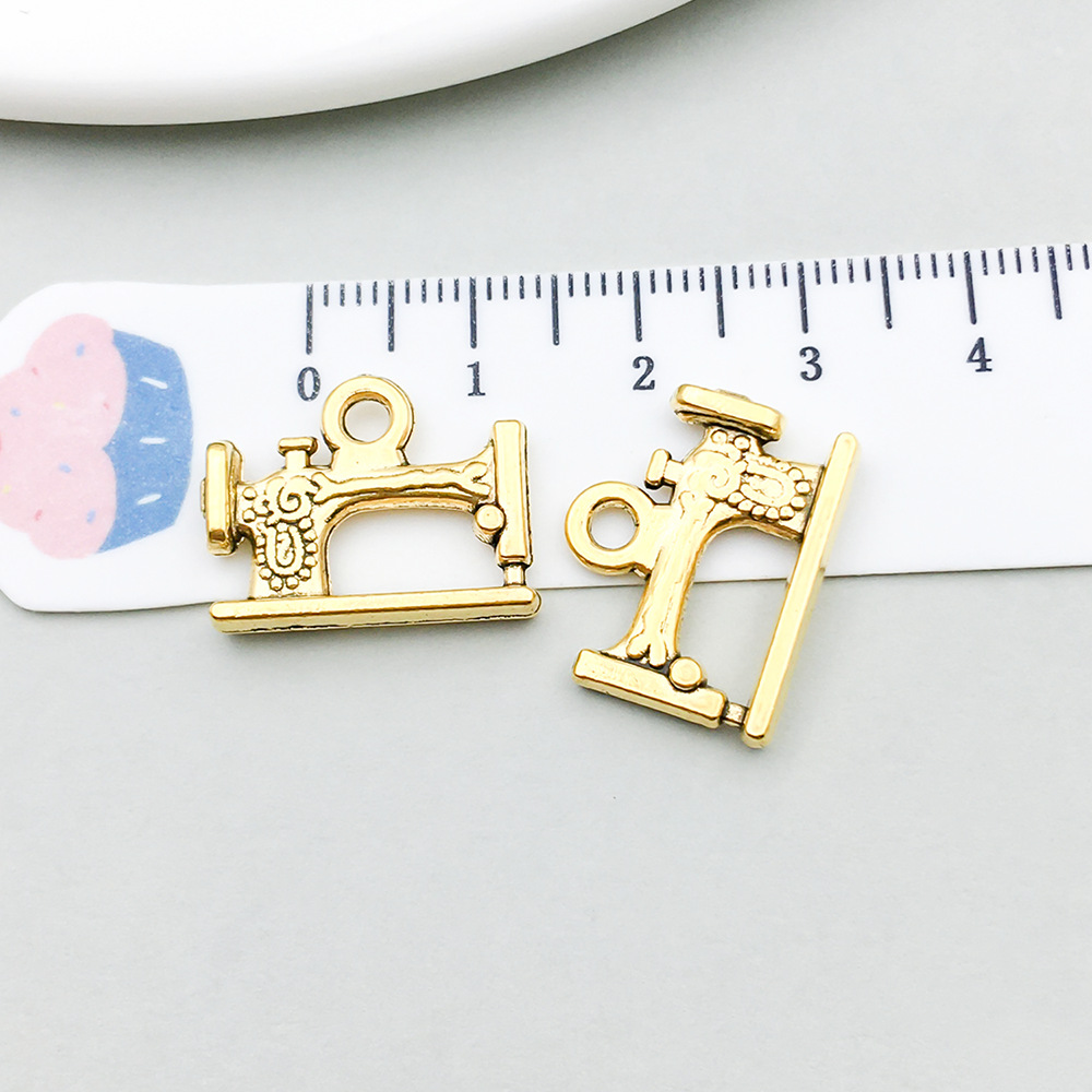 1 ancient gold sewing machine 19*15mm