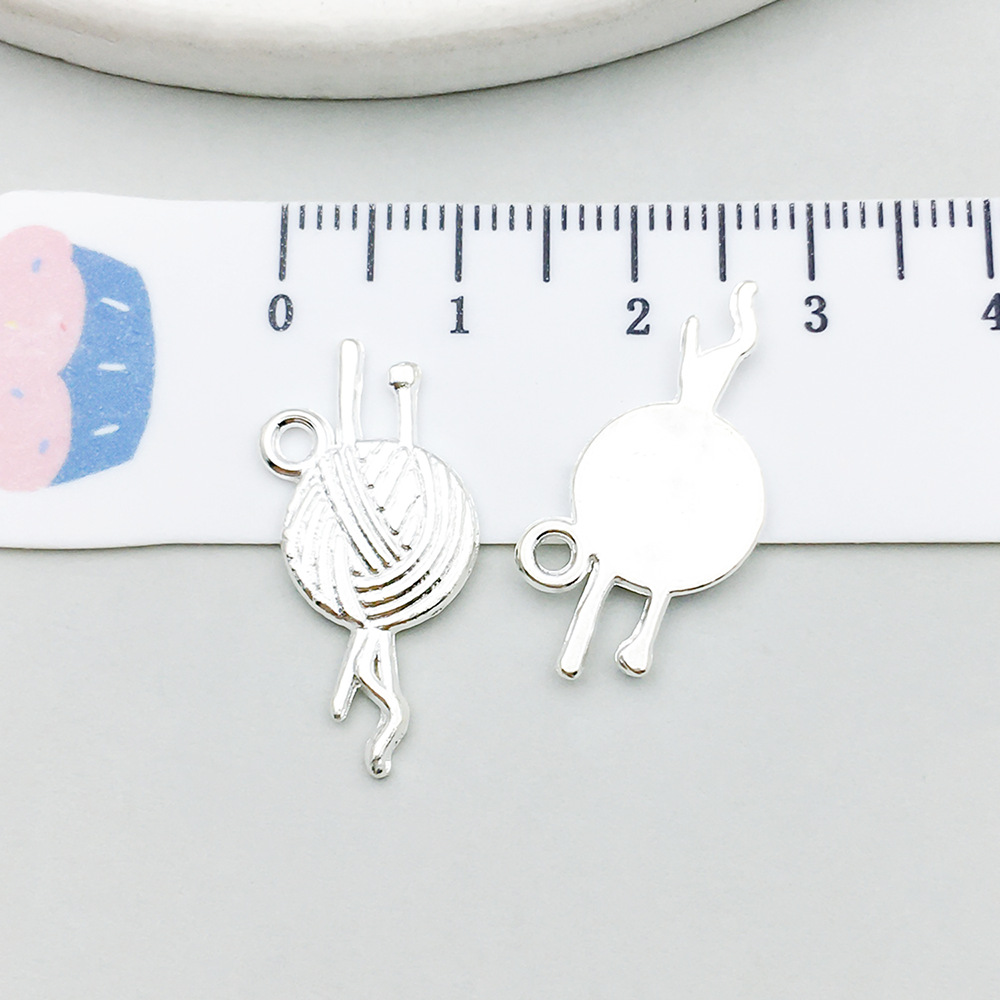 1 bright silver wool ball 12*24mm