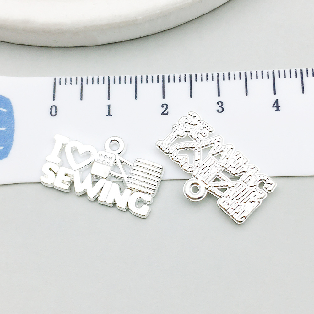 1 bright silver english letter 21*12mm