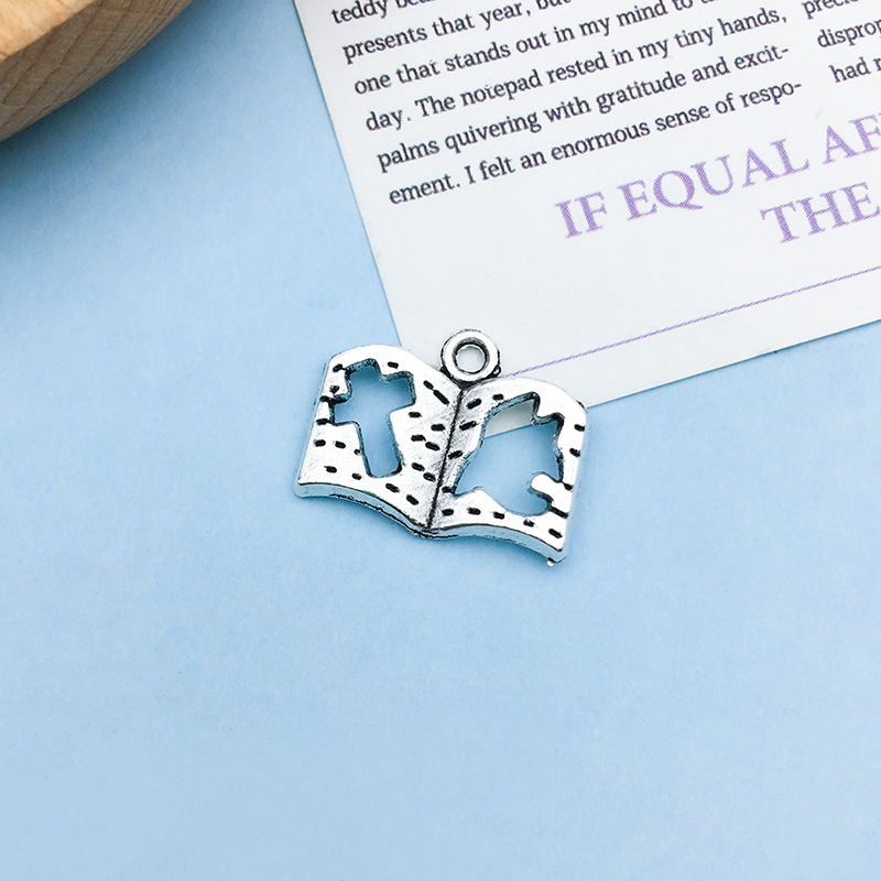 1 12155-ancient silver graduation season book cross 17 × 13mm