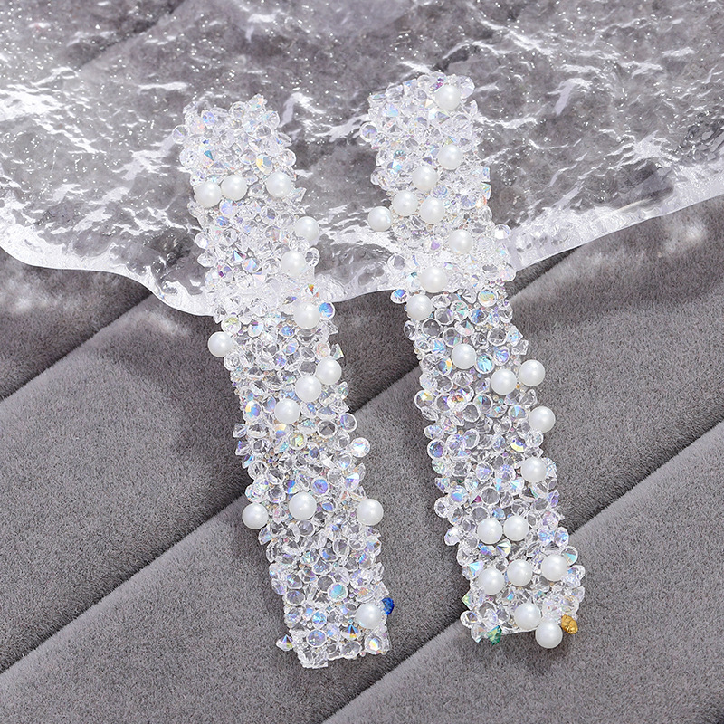 1 transparent white diamond [with pearls]]