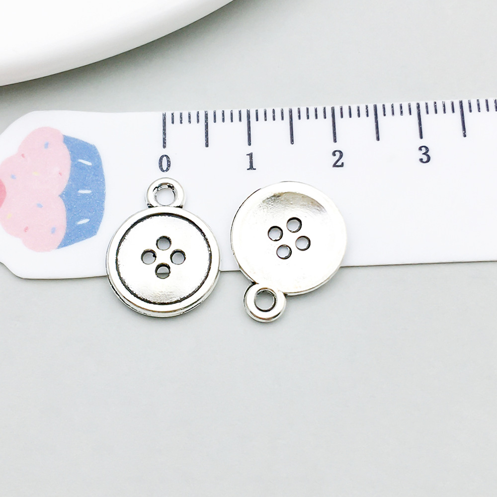 1 ancient silver button 13*16mm