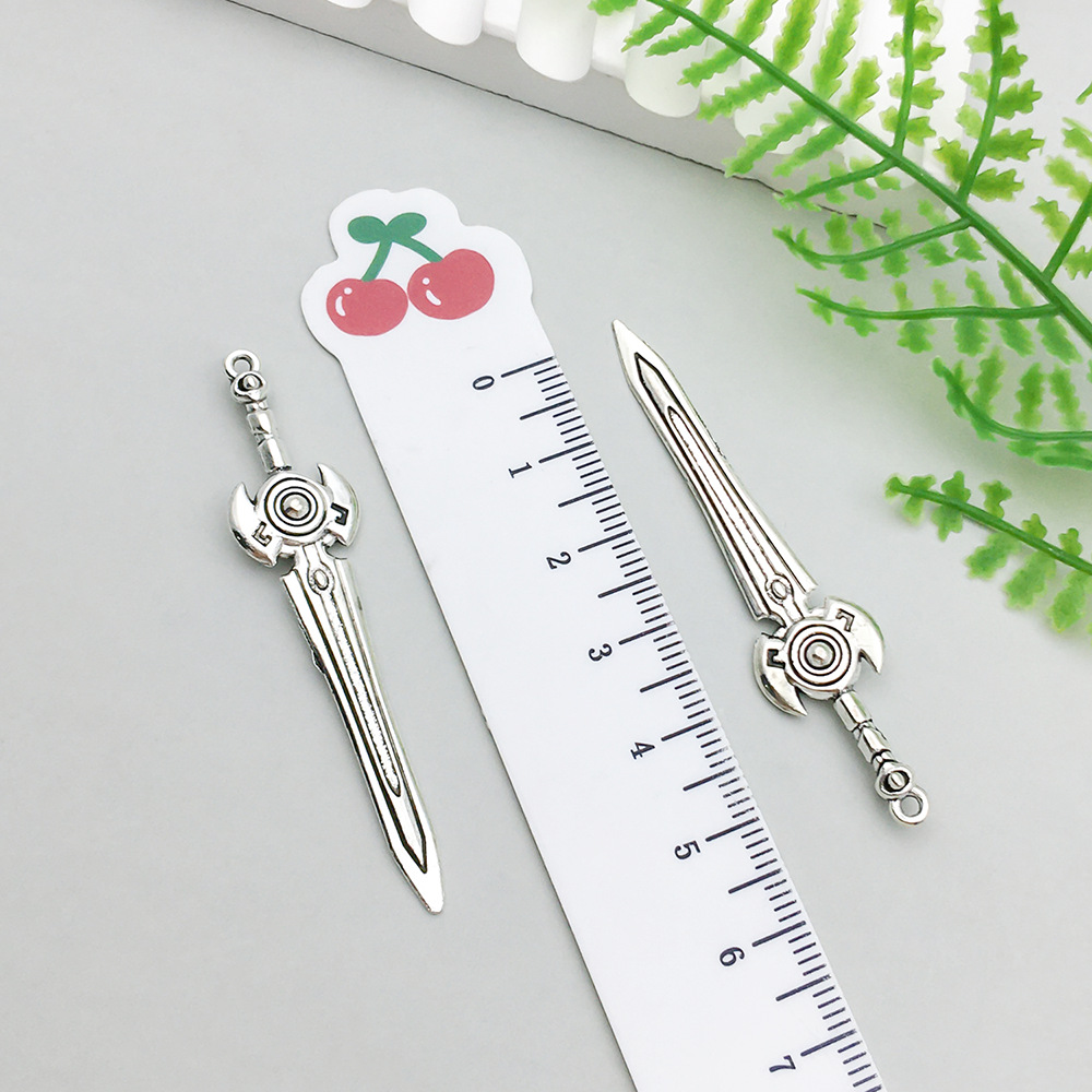 1 ancient silver sword 12*69mm