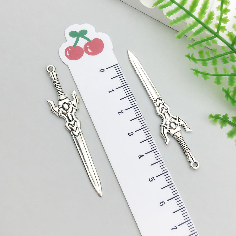 1 ancient silver sword 12*59mm