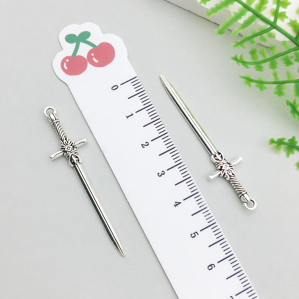 1 ancient silver sword 12*47mm