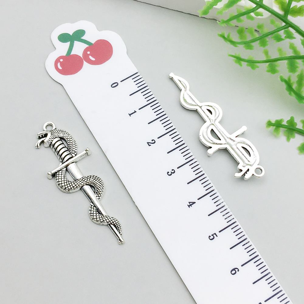 1 ancient silver sword 13*39mm