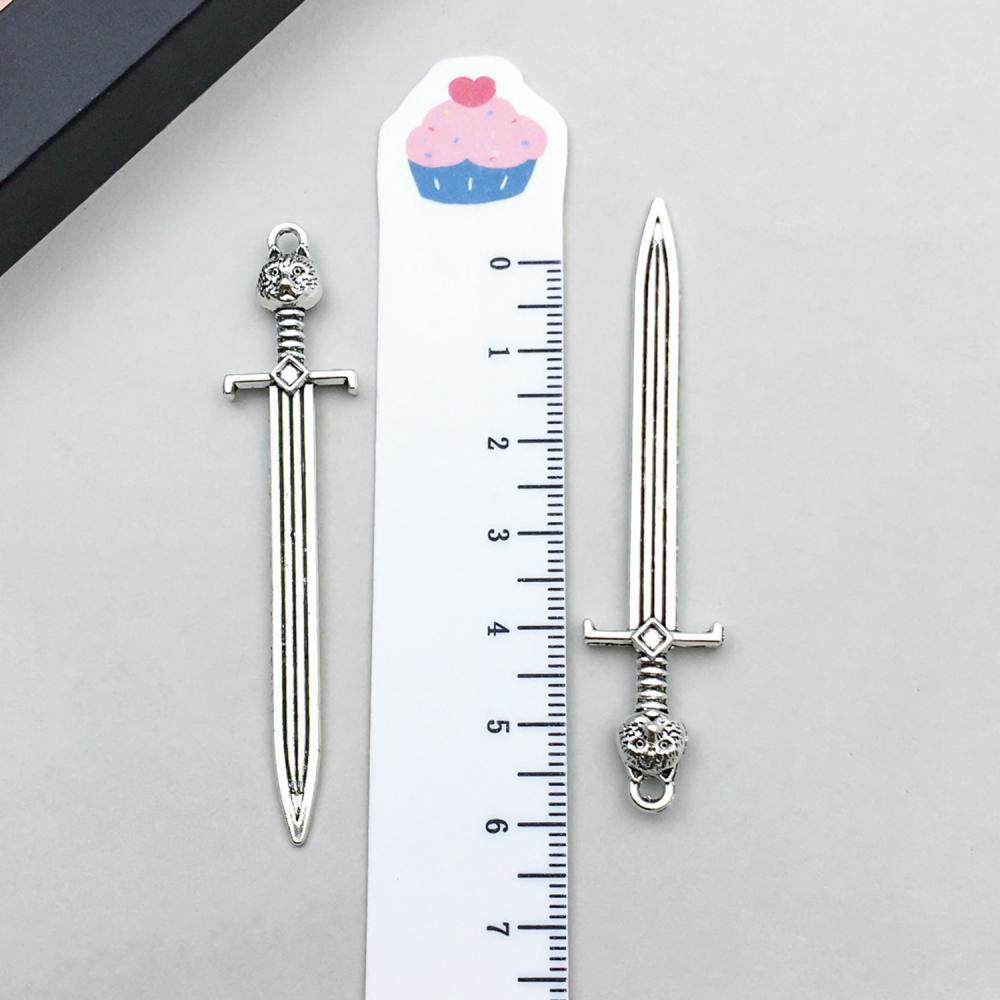 1 ancient silver cat head sword 15*66mm