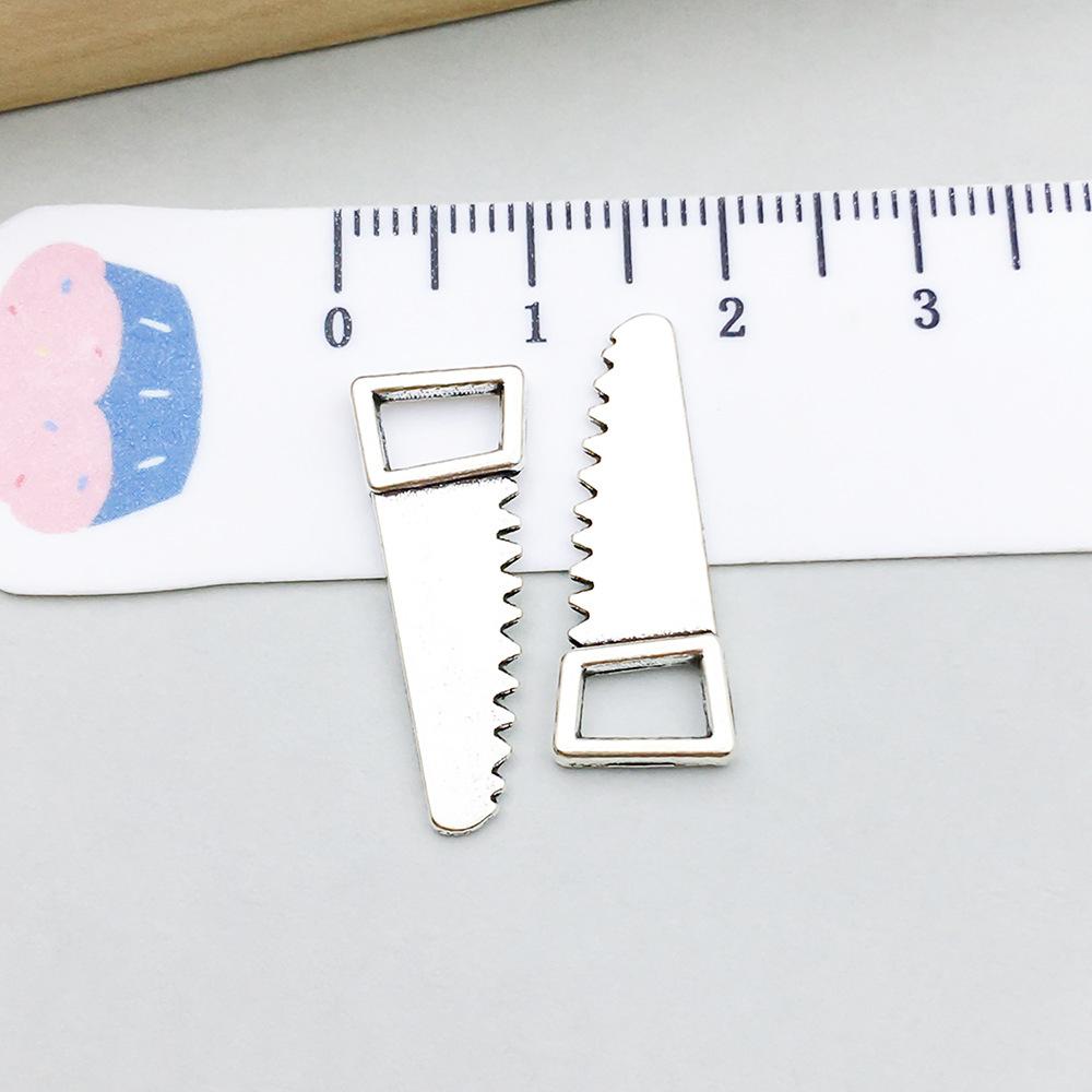 1 ancient silver saw 9*23mm