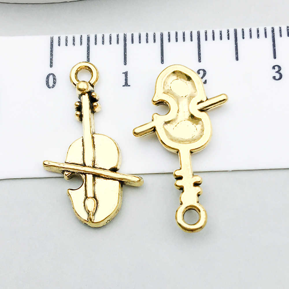 1 ancient gold violin 14*23mm