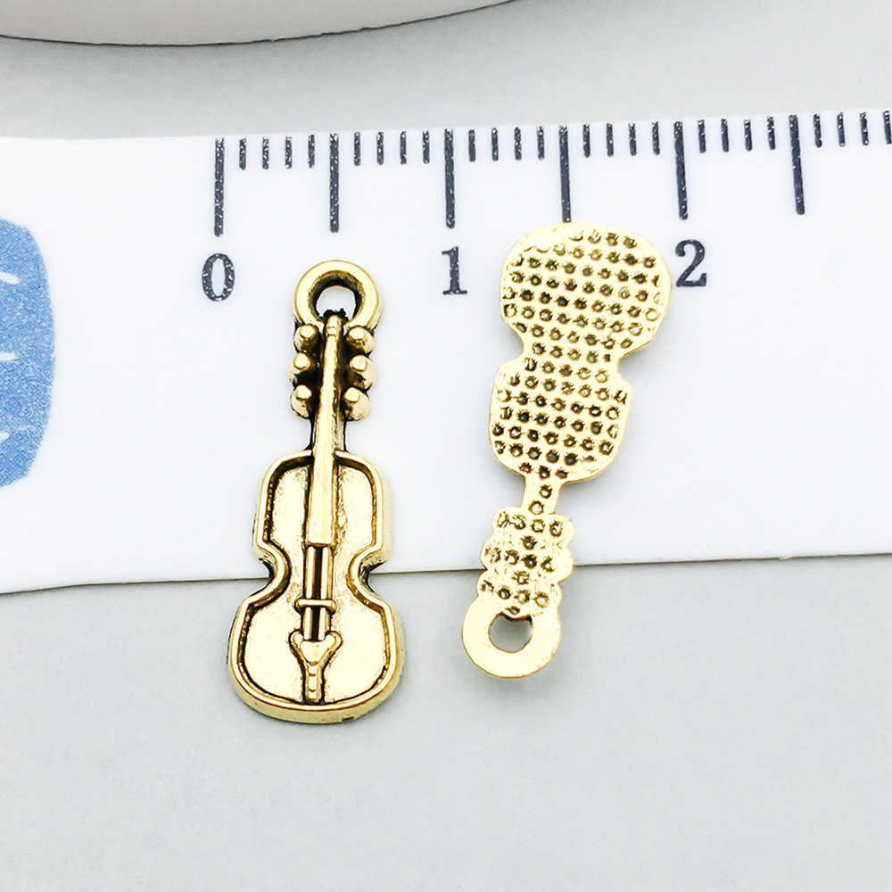 1 ancient gold guitar 8*20mm