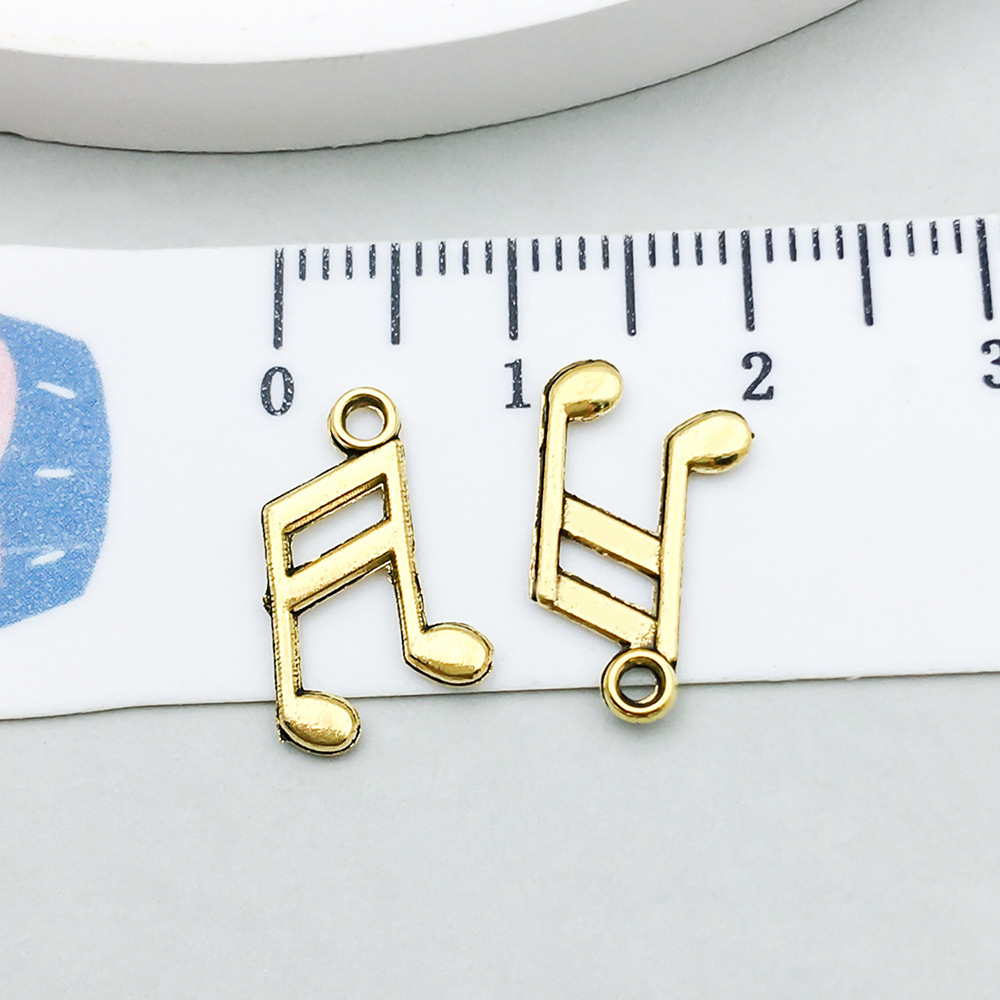 1 ancient gold music symbol 9*20mm