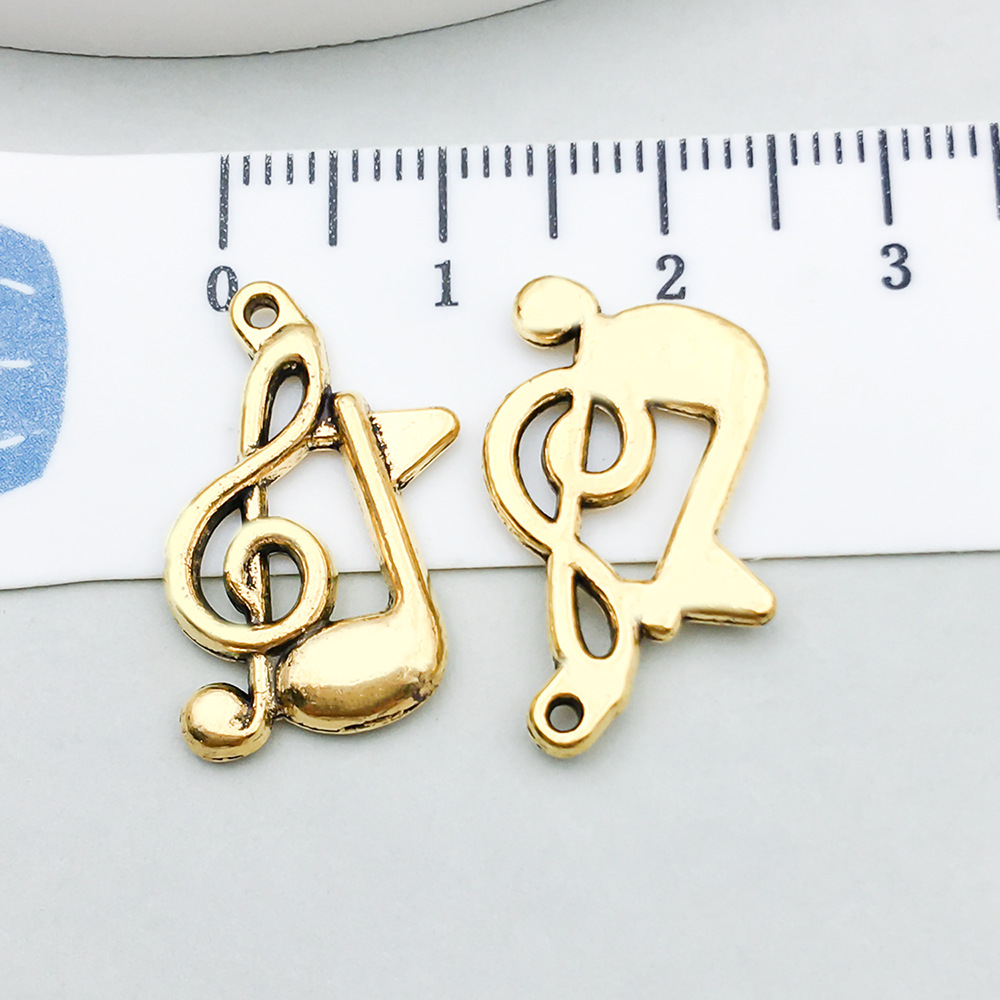 1 ancient gold music symbol 17*21mm