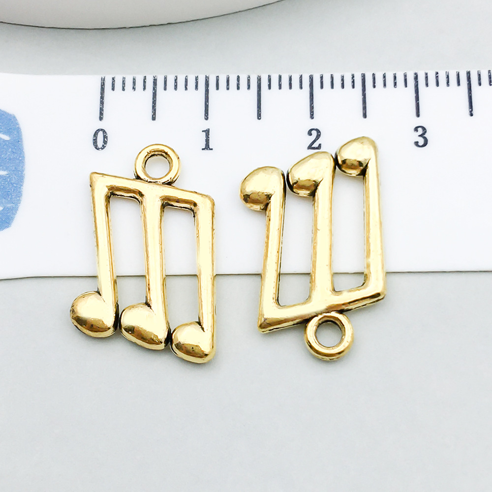 1 ancient gold music symbol 13*21mm