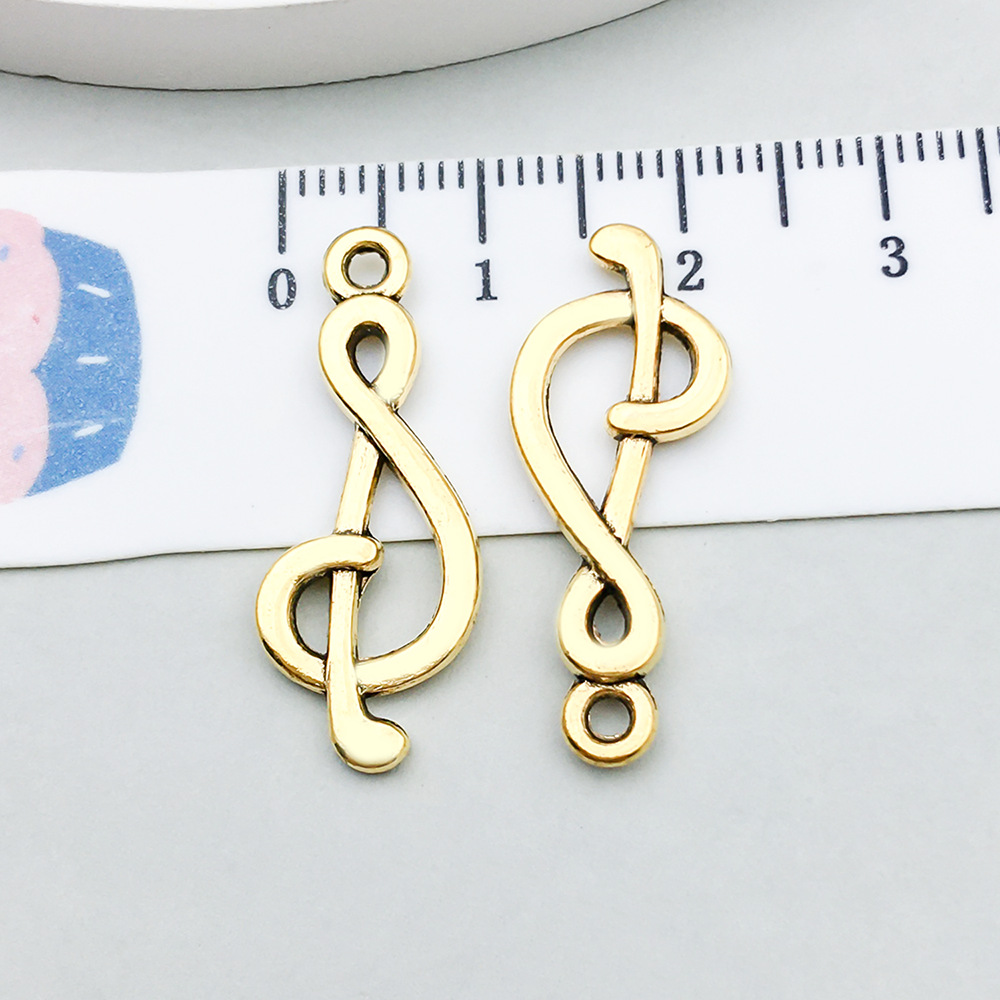 1 ancient gold music symbol 10*27mm-