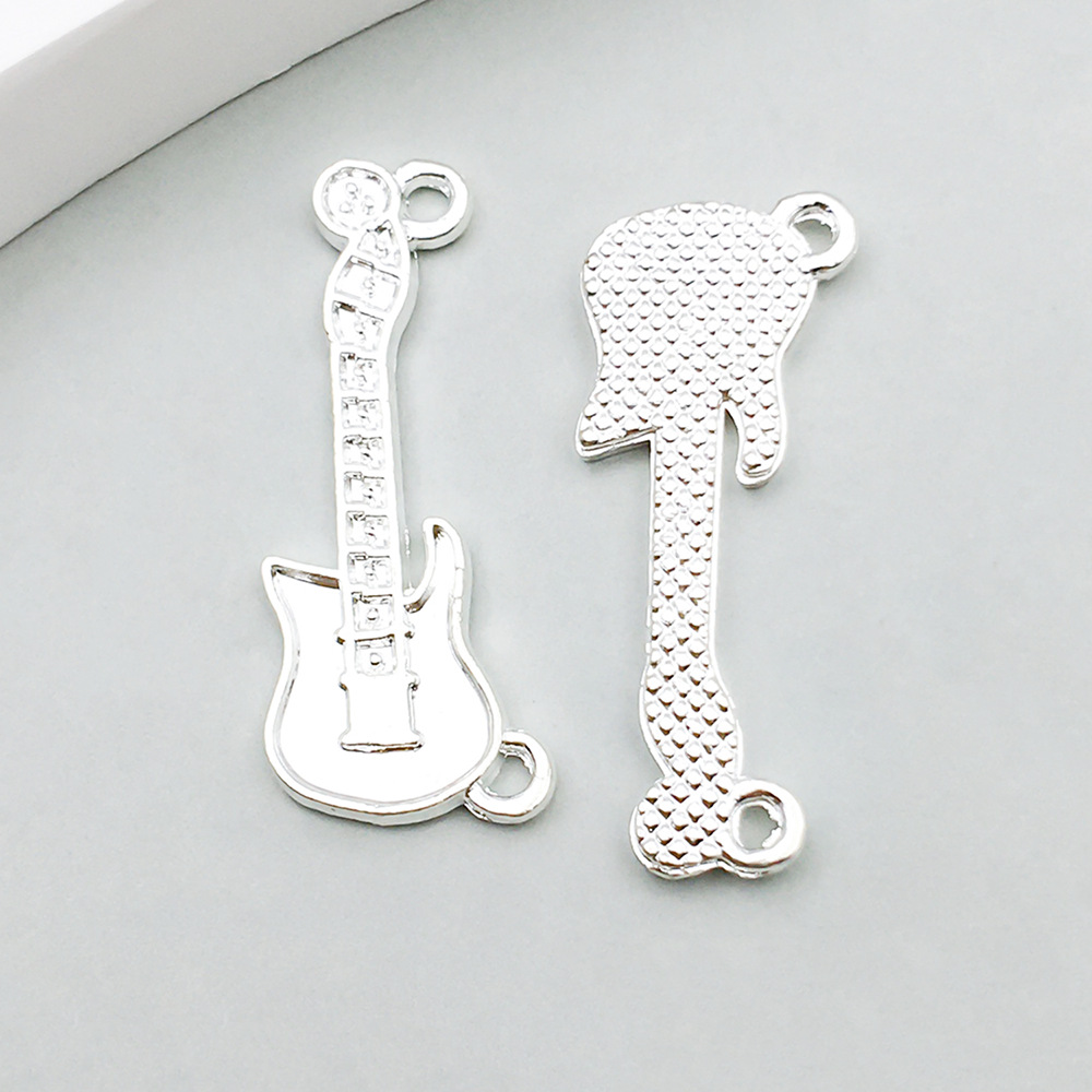 1 bright silver guitar 26*11mm