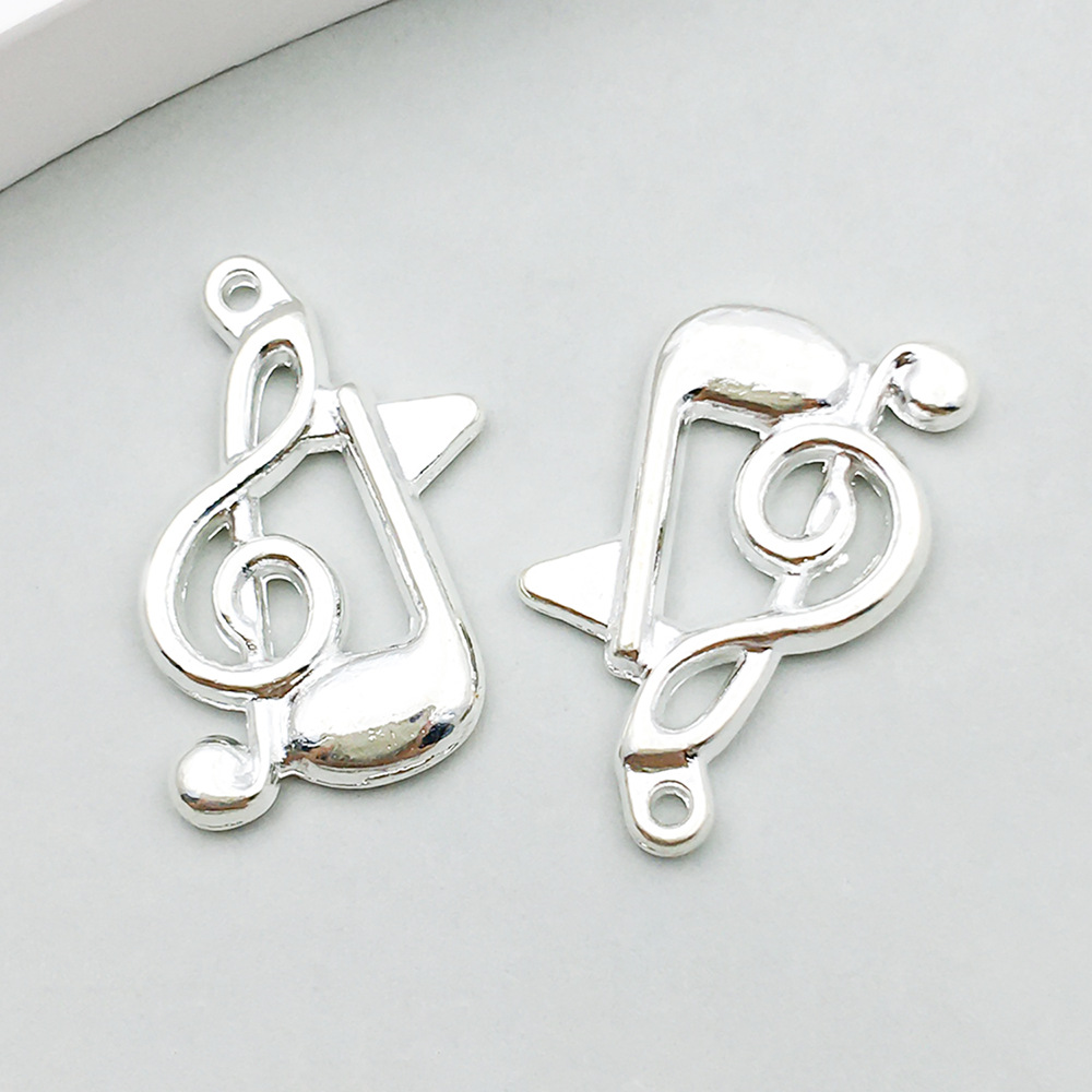 1 bright silver music symbol 17*21mm-