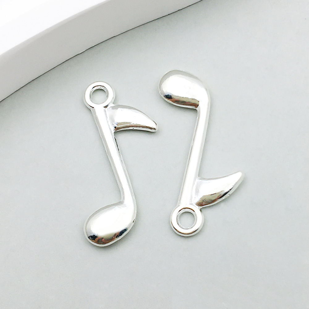 1 bright silver music symbol 8*24mm