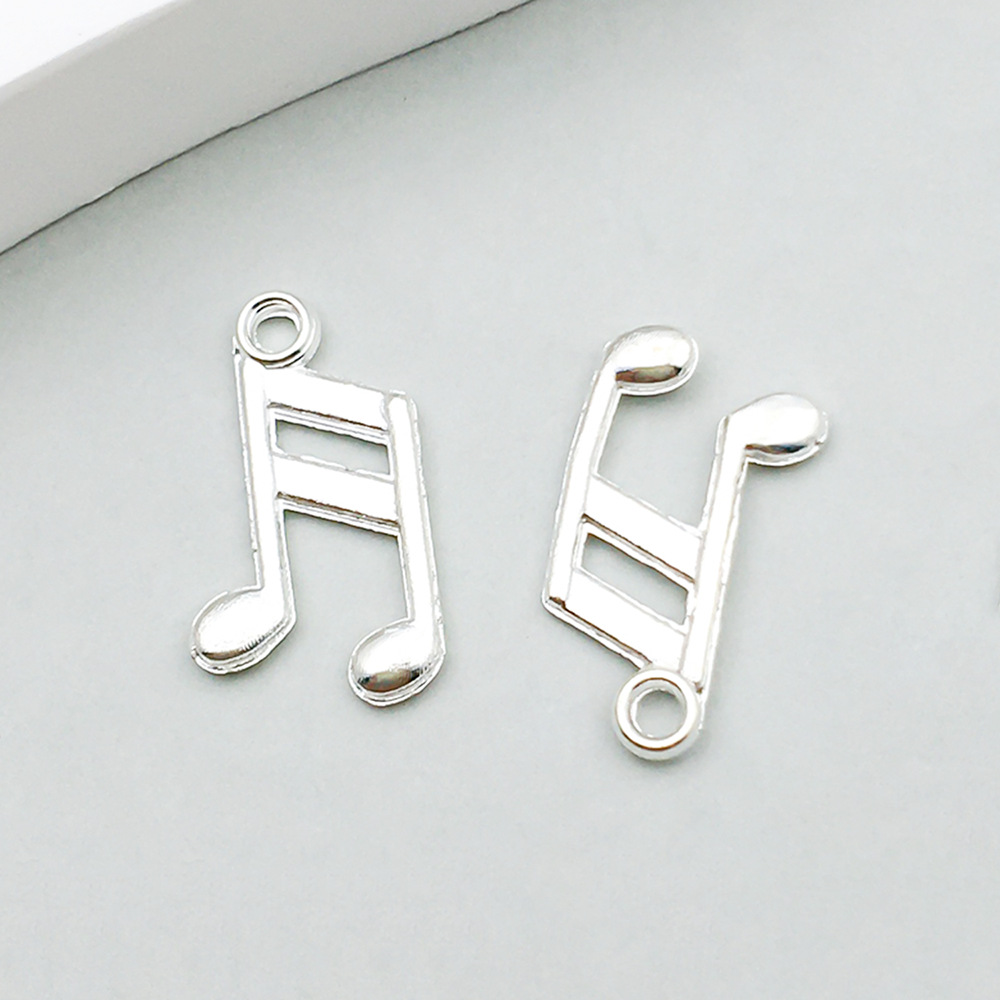 1 bright silver music symbol 9*14mm