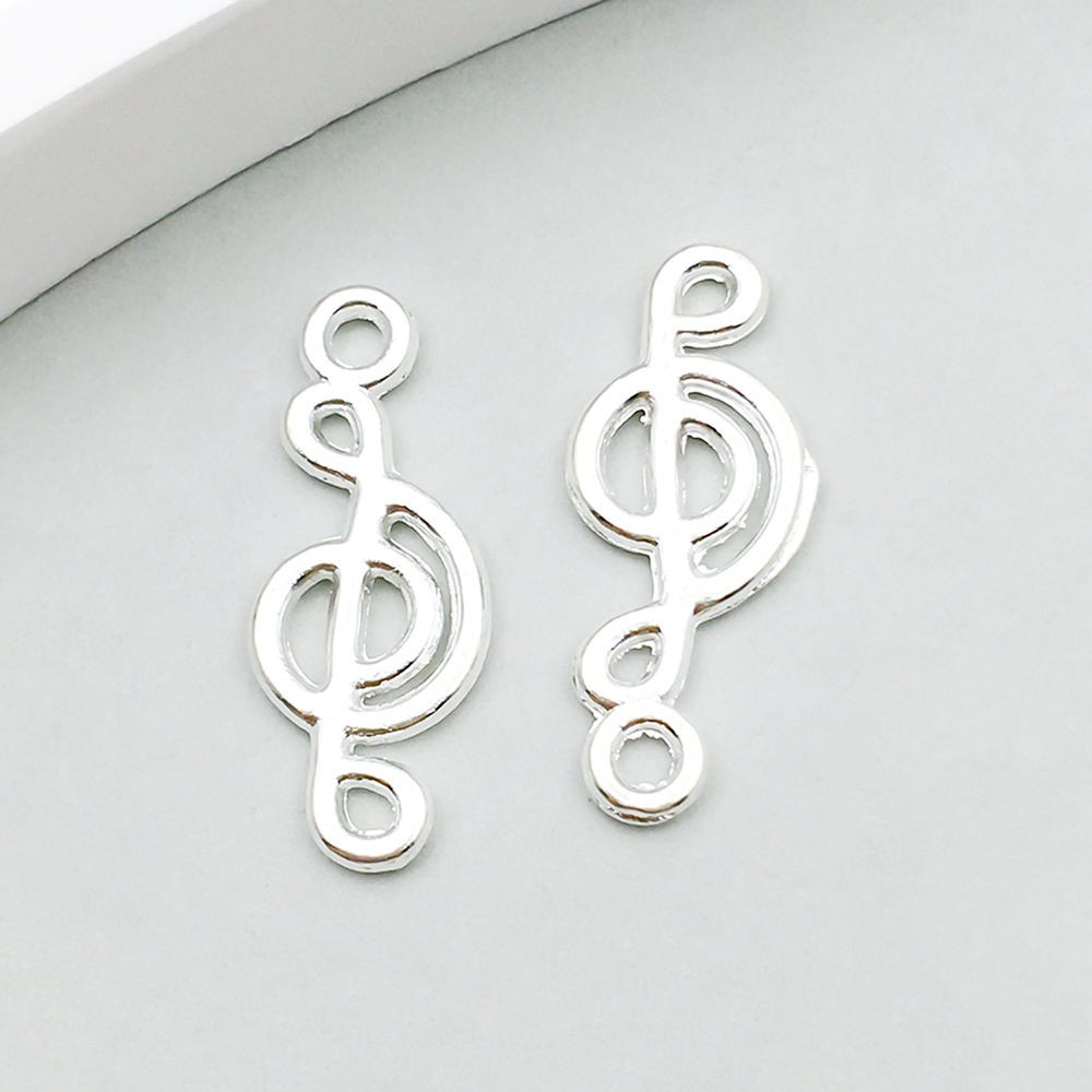 1 bright silver music symbol 8*20mm