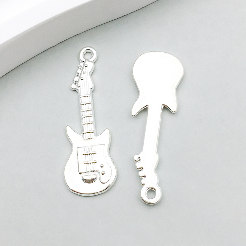 1 bright silver guitar 12*31mm