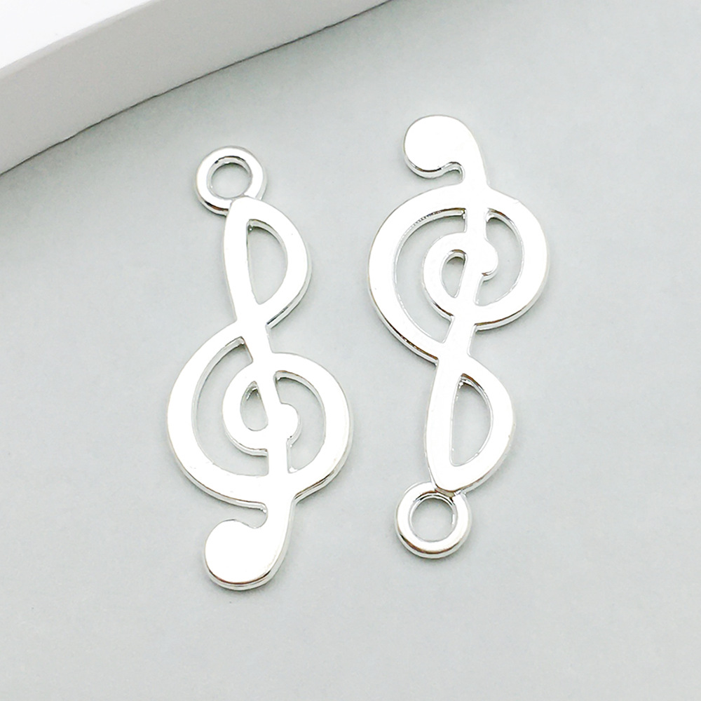 1 bright silver music symbol 10*25mm