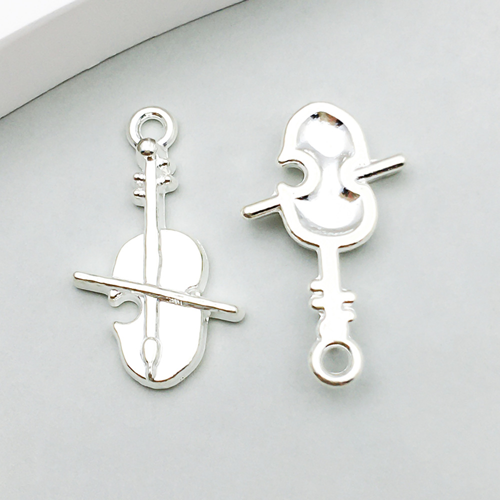 1 bright silver violin 14*23mm