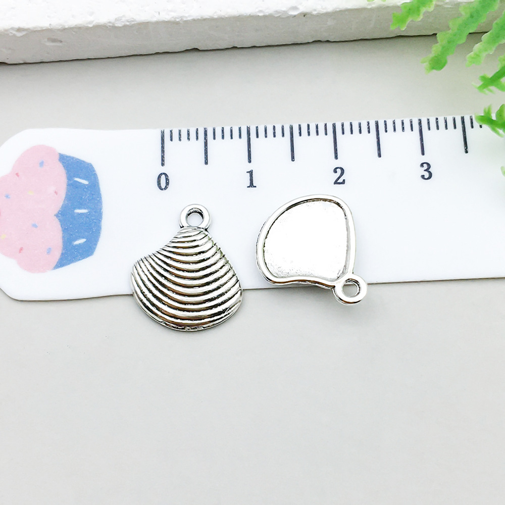 1 ancient silver shell 15*13mm-0.6g-10372