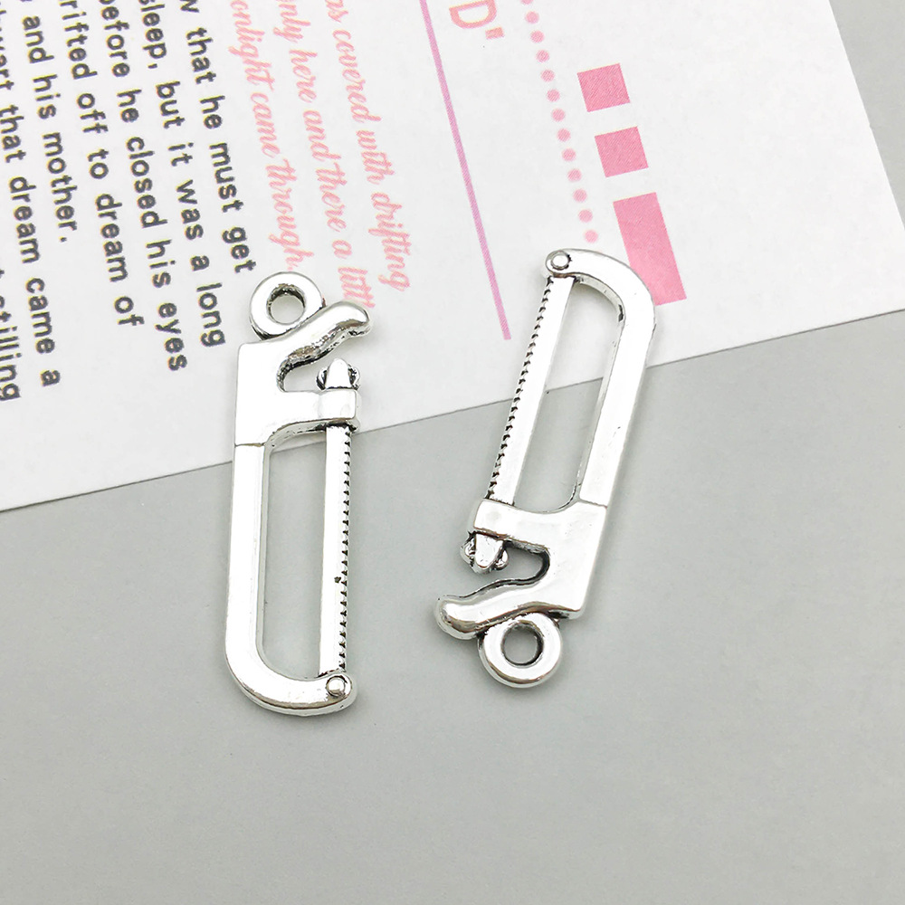 1 ancient silver tool saw 7*26mm-1.1g-8525