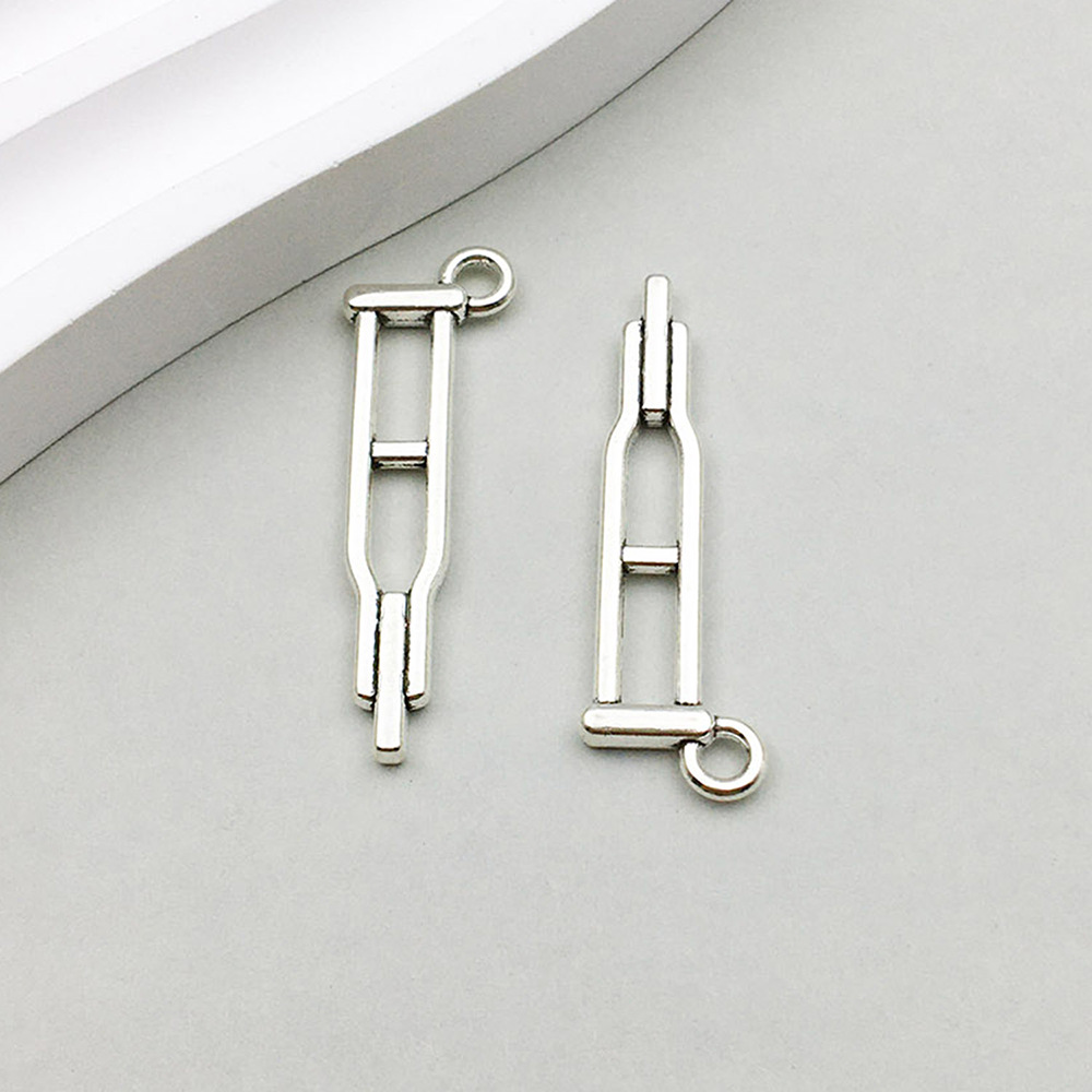 1 ancient silver medical crutch 10*32mm-1.3g-12148