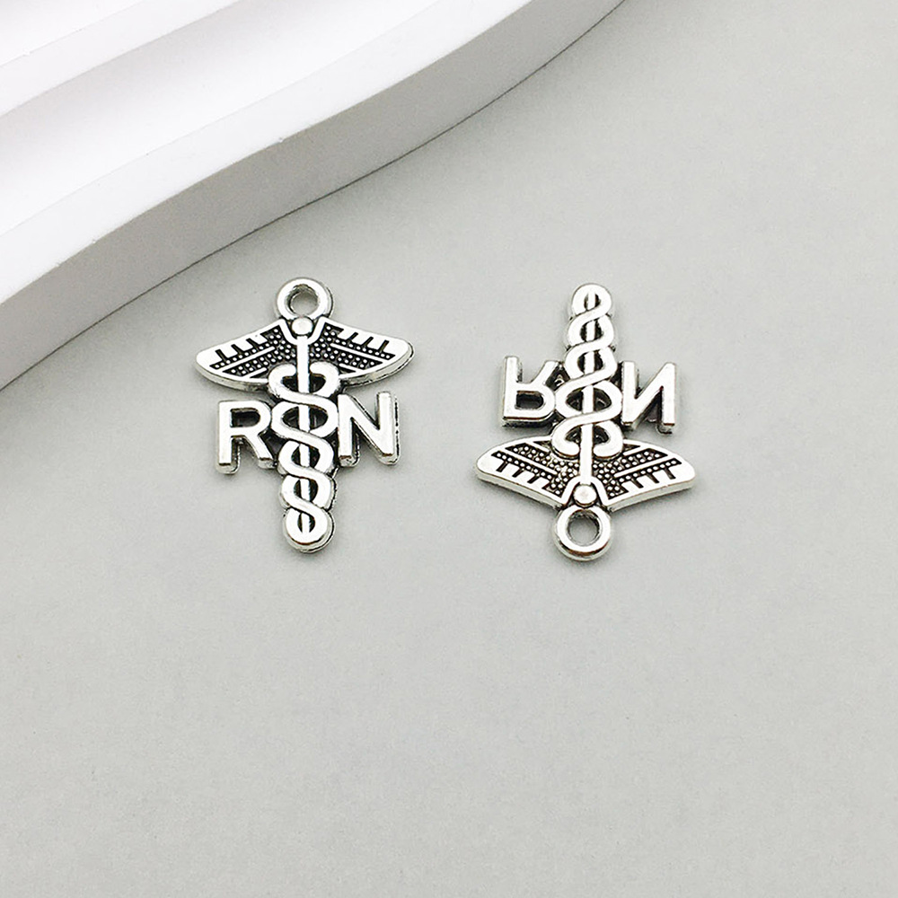 1 Ancient Silver Letter Medical RN Double Snake Crutch 15*20mm-1.4g-12149