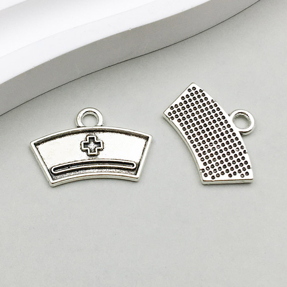 1 ancient silver fan-shaped medical nurse hat 20*13mm-0.8g-12151