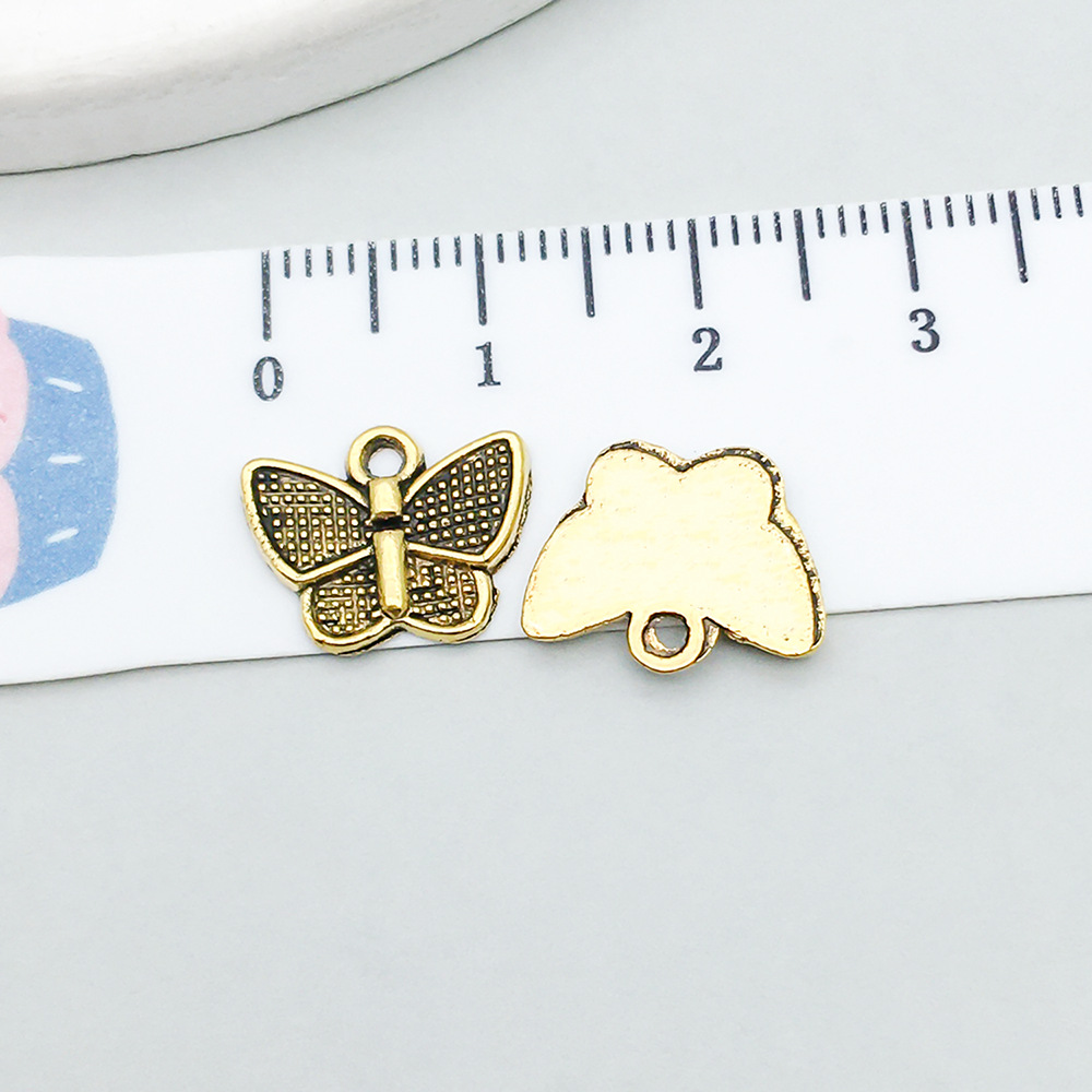 1 ancient gold butterfly 12*10mm-0.4g-11079