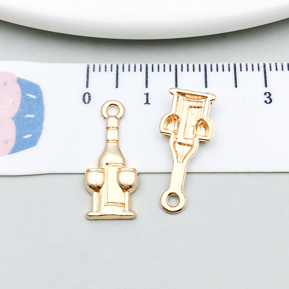 1 kc gold wine bottle 9*21mm-0.6g-18319