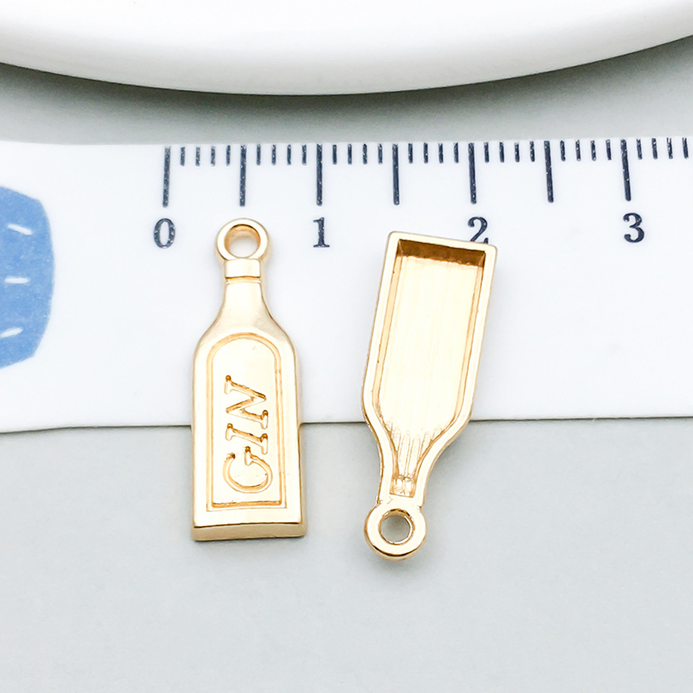 1 kc gold wine bottle 7*20mm-0.9g-20809